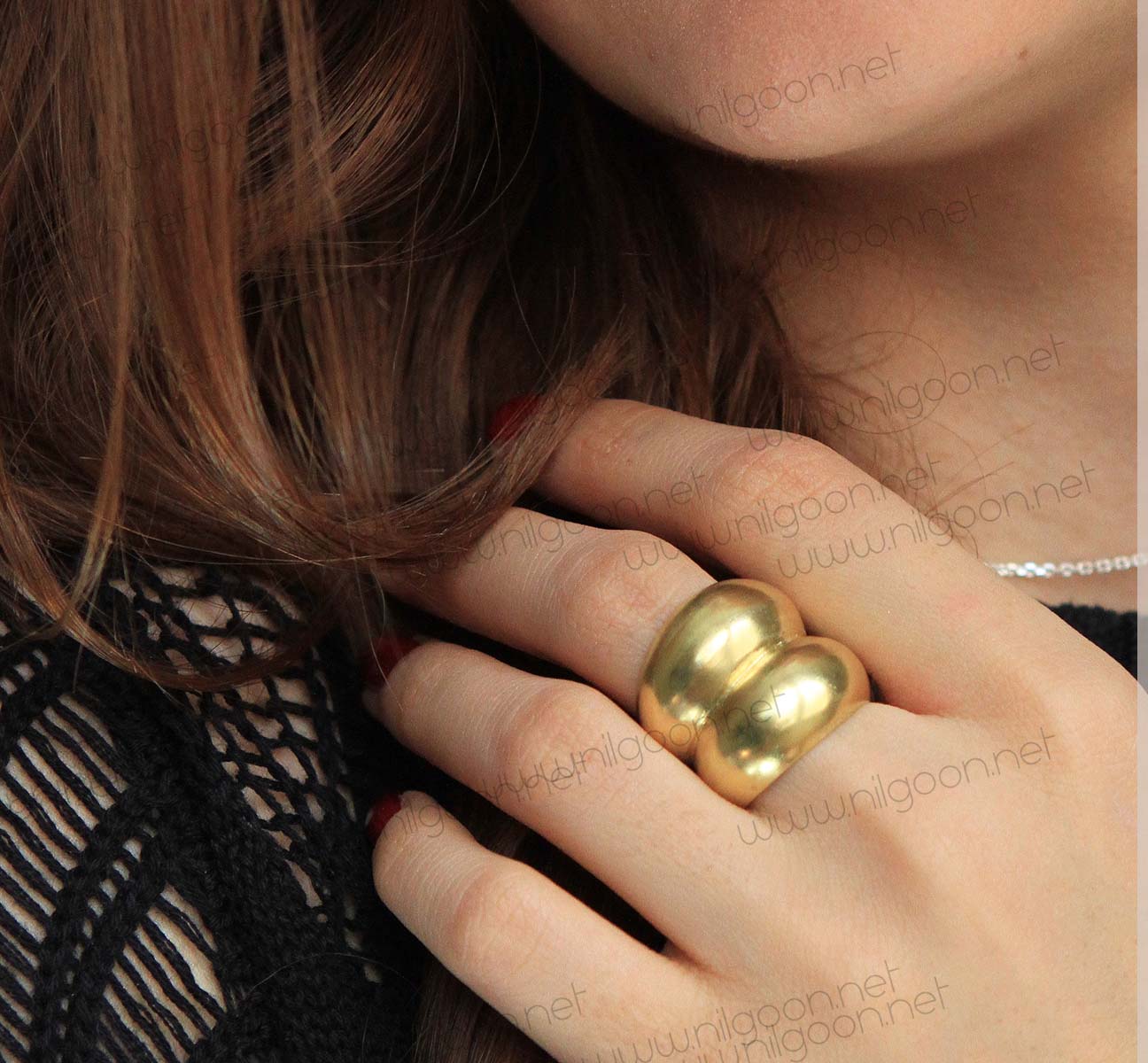 Double dome brass ring