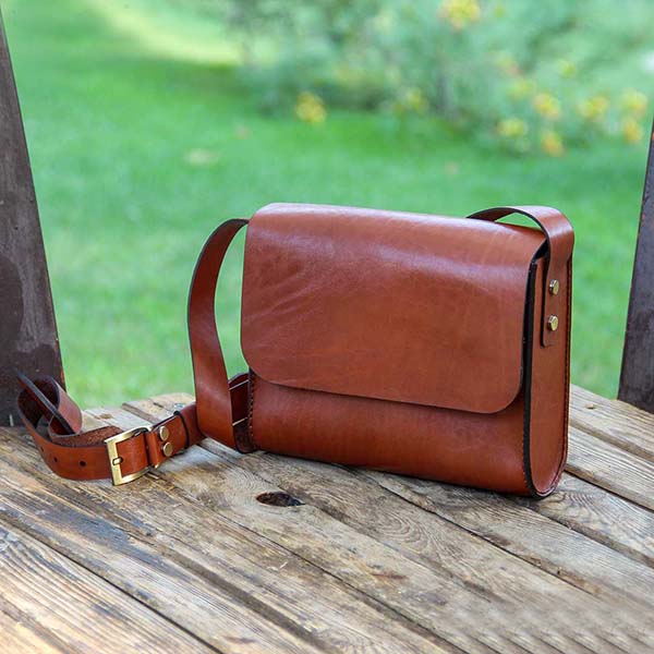 Men's and women's handmade natural leather handbag with custom engraving