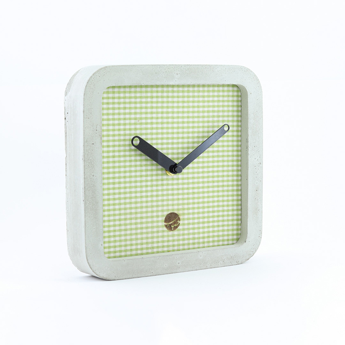 Handmade concrete wall clock with olive bubble brand