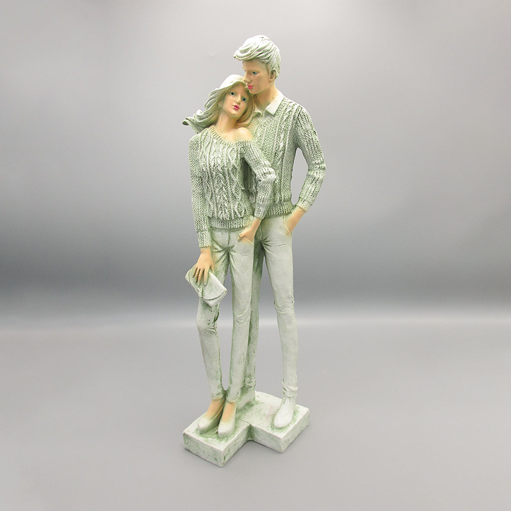 خرید عمده مجسمه دختر وپسر در آغوش