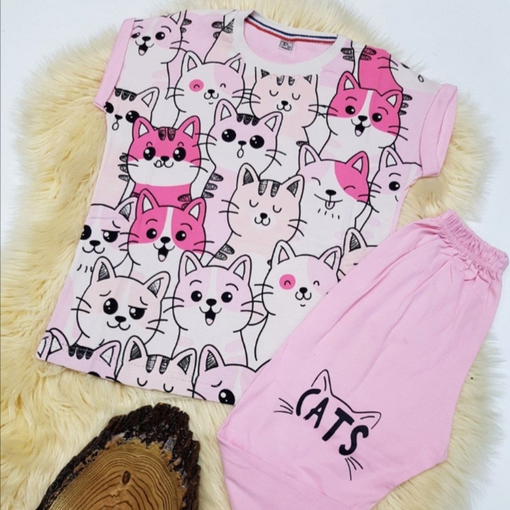 خرید عمده ست دخترانه تیشرت شلوارک طرح گربه تک رنگ و 2 سایز 