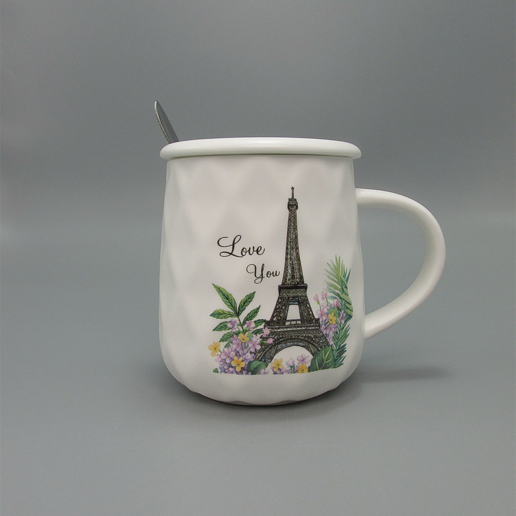 White ceramic mug with Eiffel tower design