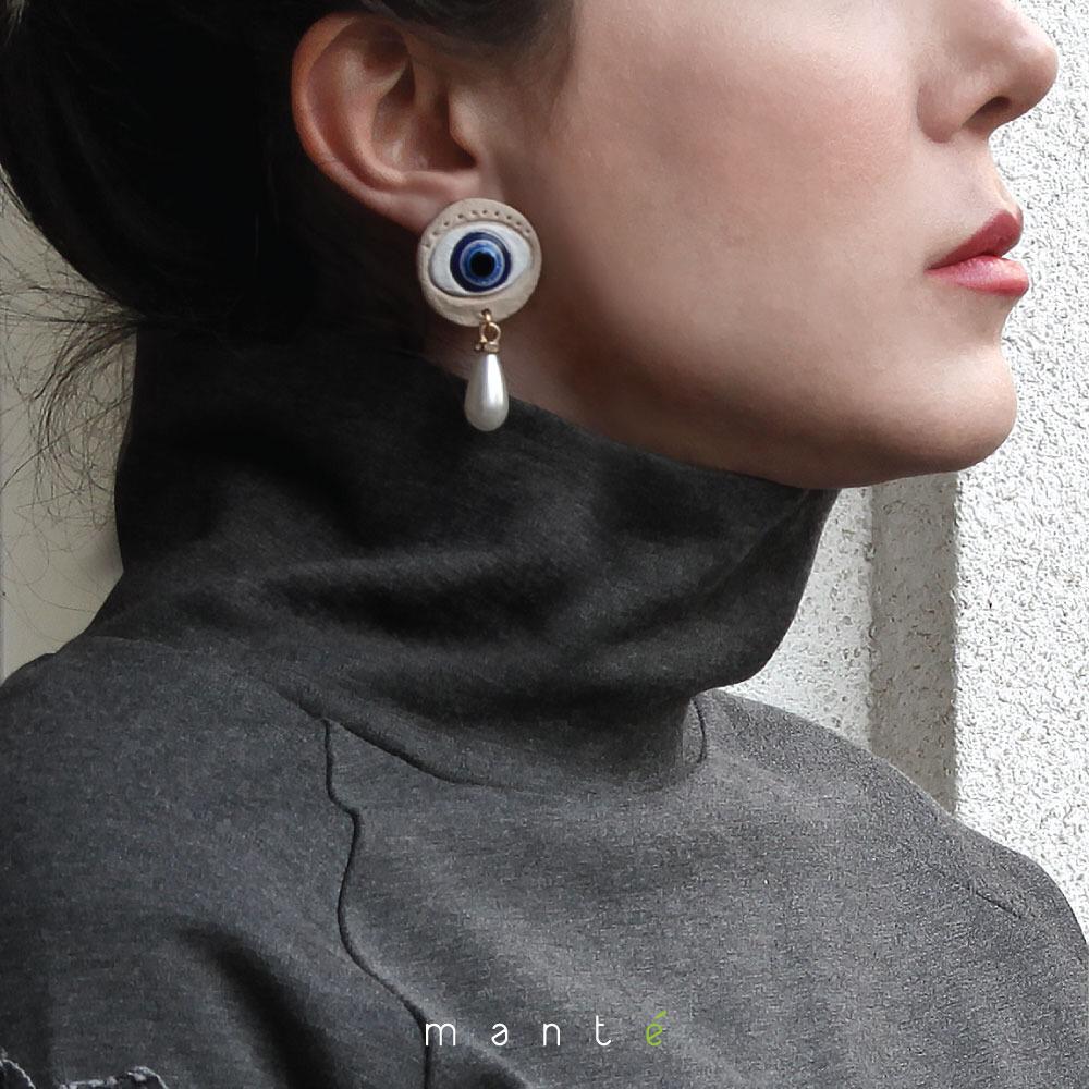 Handmade ceramic earrings with eye and teardrop design