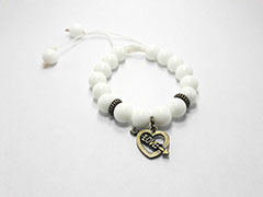 wholesale White beaded bracelet with brass heart design
