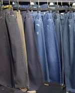 شلوار بگ از جنس جین پشت کش دارای سایزبندی رنگ مشکی و ذغالی - Image 2